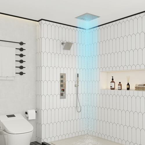 Modern bathroom with rain shower and white tile walls.