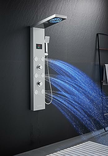 Modern shower panel with blue water streams.